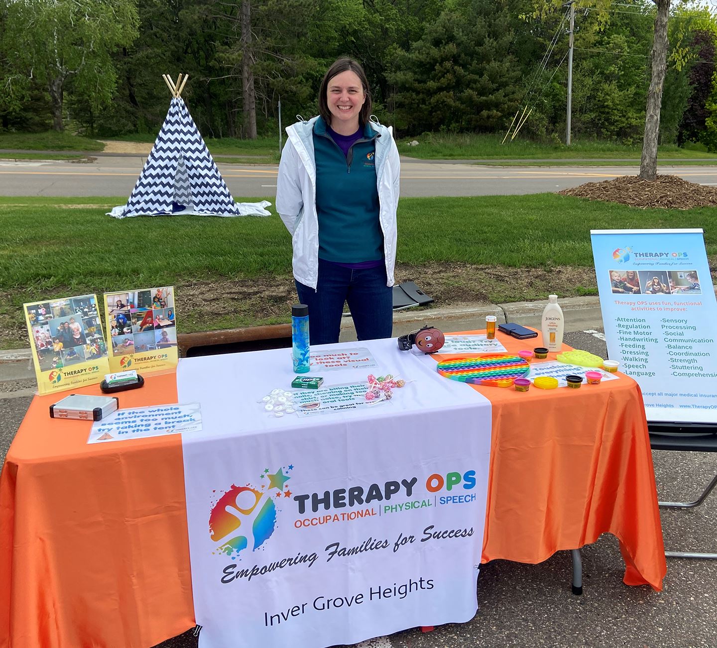 Photo of woman at Therapy Ops Sponsor Booth