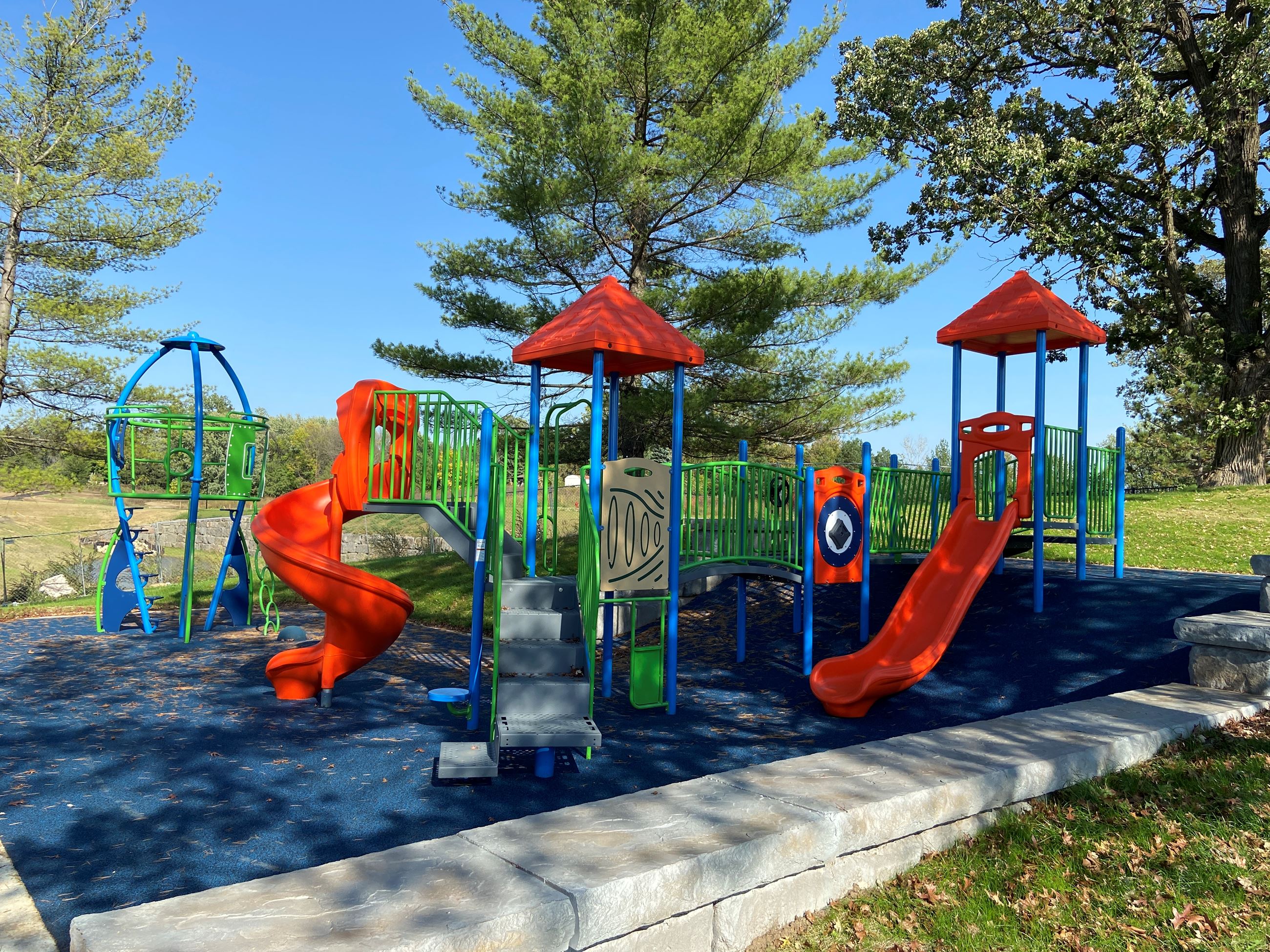 Playground and rocket ship climbing structure at Argenta Hills Park