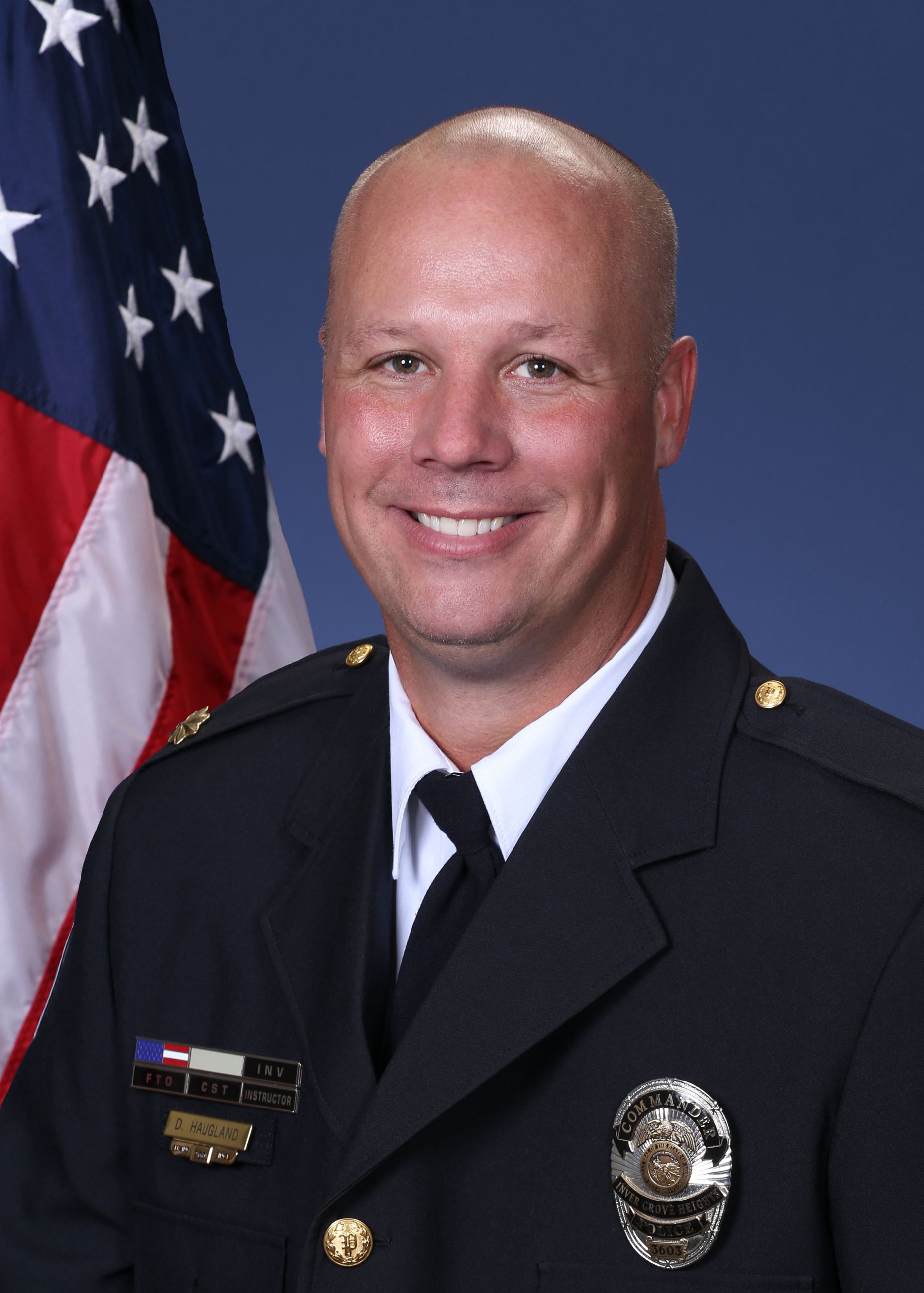 Headshot photo of IGH PD Patrol Division Commander Dennis Haugland