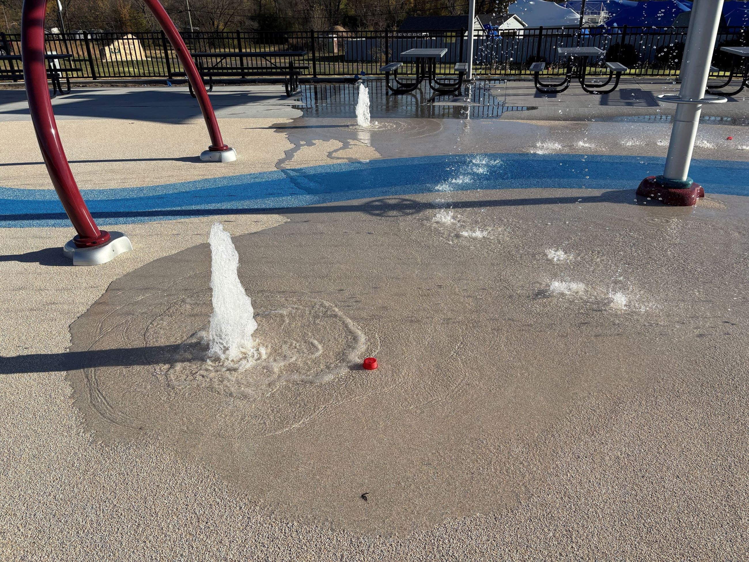 Ground elements spraying water at the Heritage Village Park splash pad